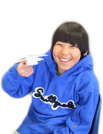 Photo: Student shows his satellite model